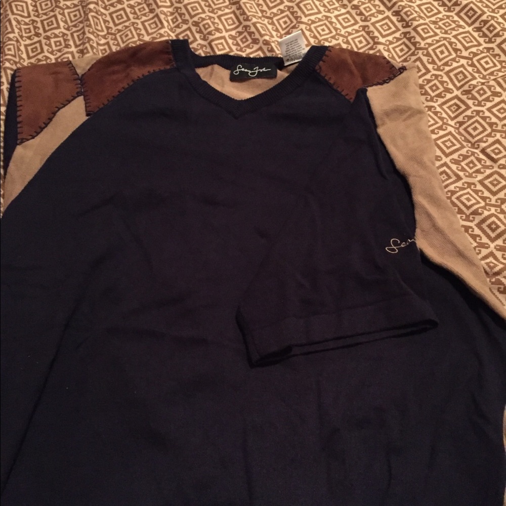 V-neck sweater with suede patches